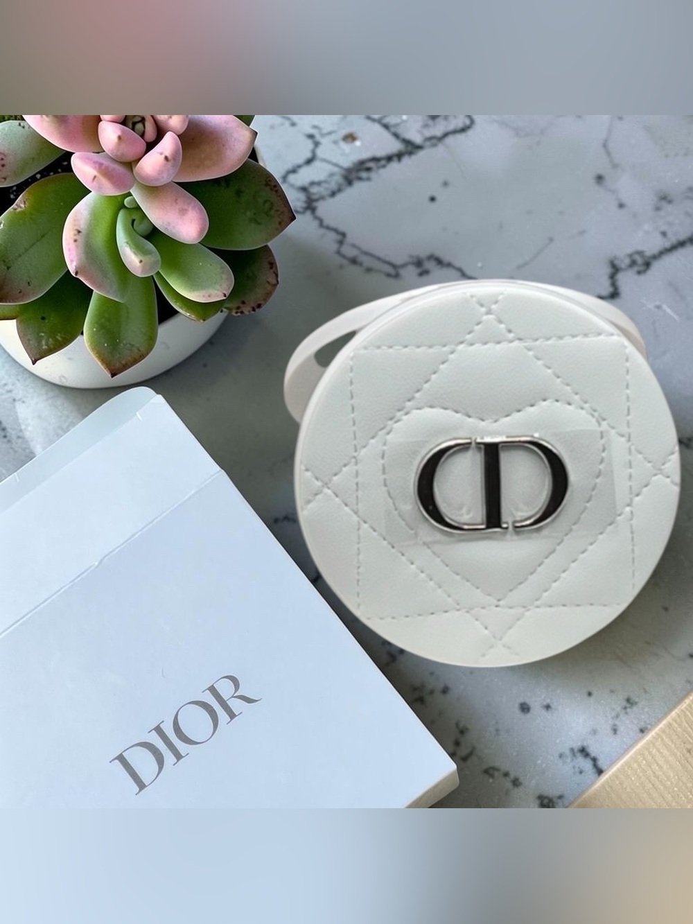 ✨✨✨ Christian Dior WHITE Quilted Compact Mirror featuring a silver "CD" logo. 🆕